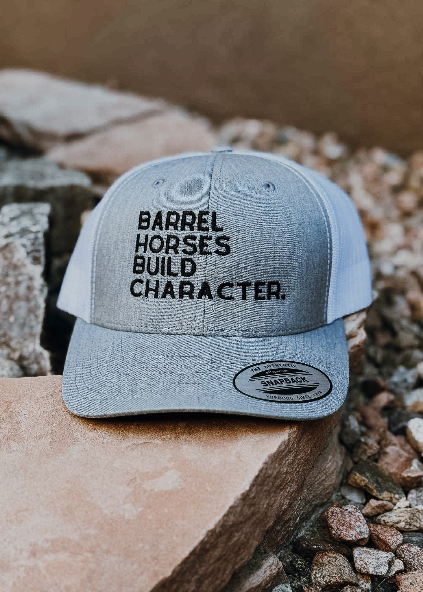 Gray Embroidered Barrel Horses Build Character Trucker Hat Embroidered TCC Hat The Cinchy Cowgirl