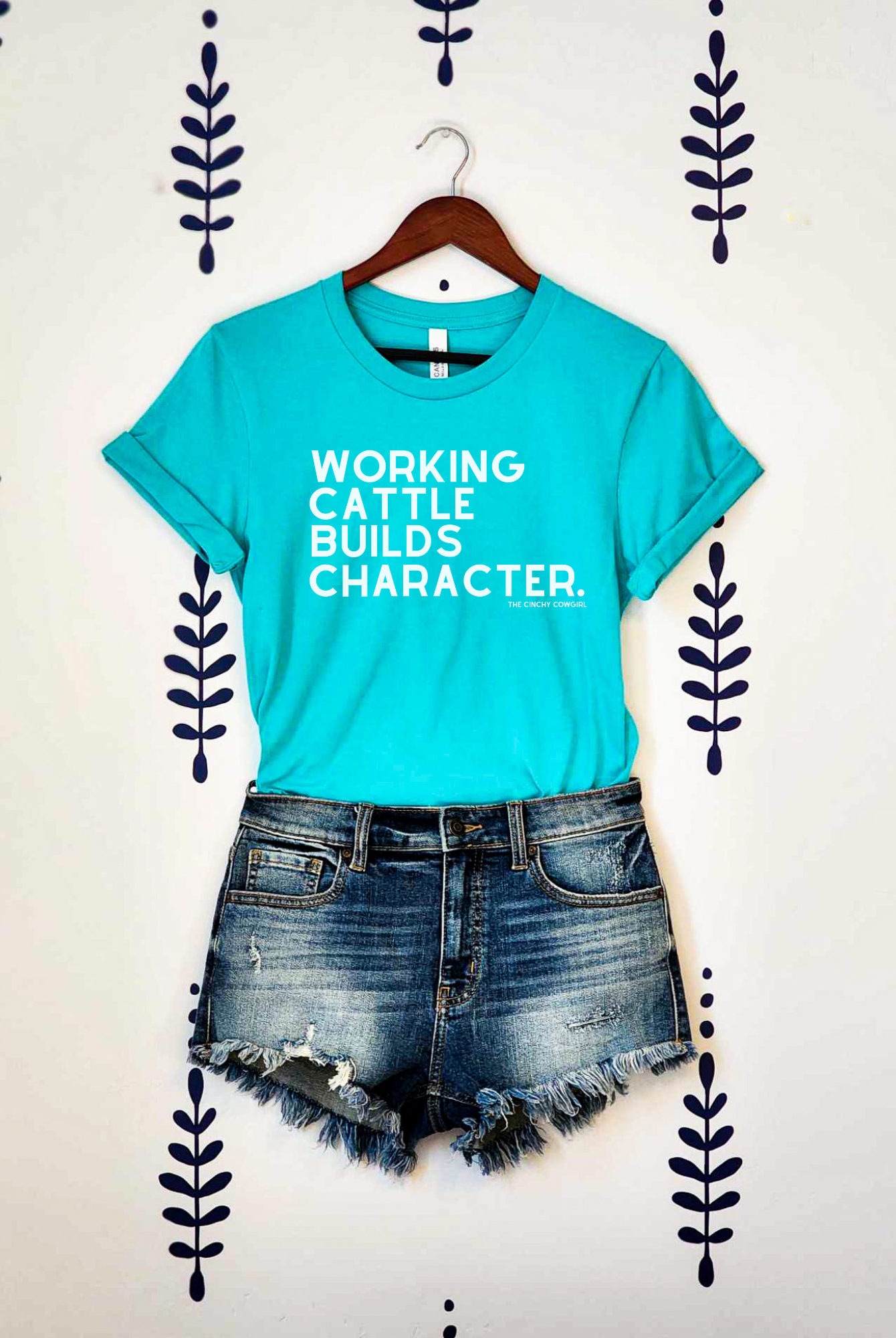 Working Cattle Builds Character Short Sleeve Graphic Tee Short Sleeve Graphic Tee The Cinchy Cowgirl