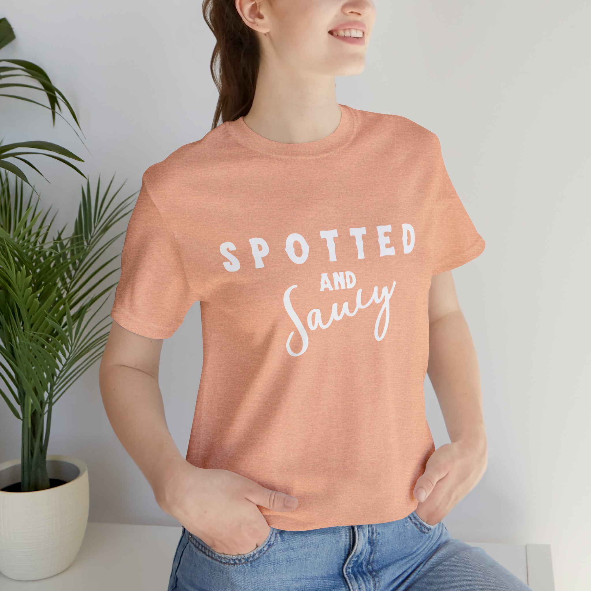 Spotted & Saucy Short Sleeve Tee Horse Color Shirt Printify Heather Peach XS 