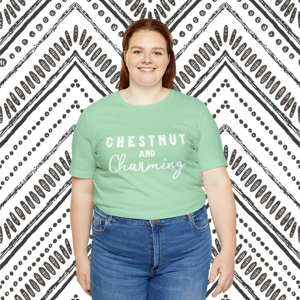 Mint plus size short sleeve with white lettering reading "Chestnut and Charming". 