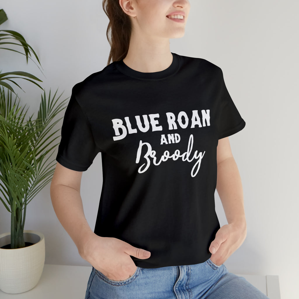 Black short sleeve with white lettering reading "Blue Roan and Broody". 