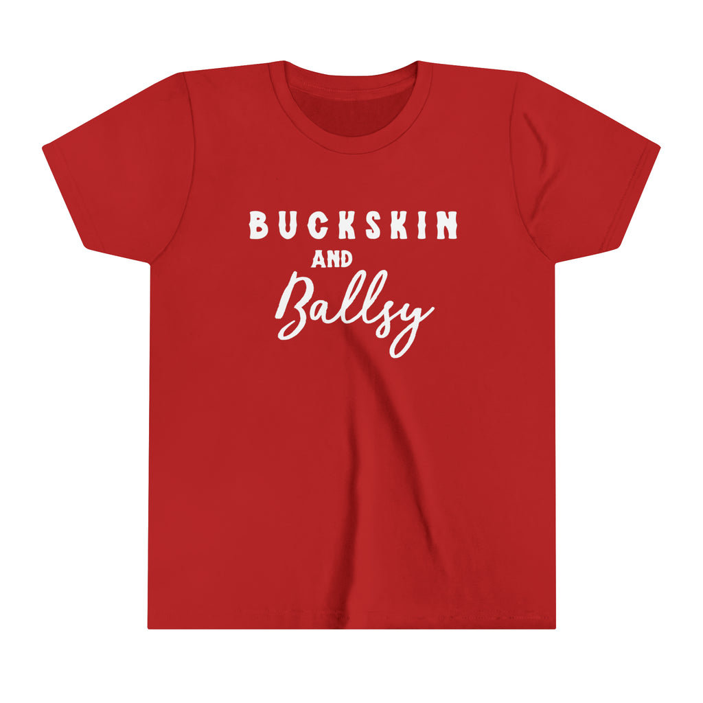 Red youth short sleeve with white lettering reading "Buckskin and Ballsy". 