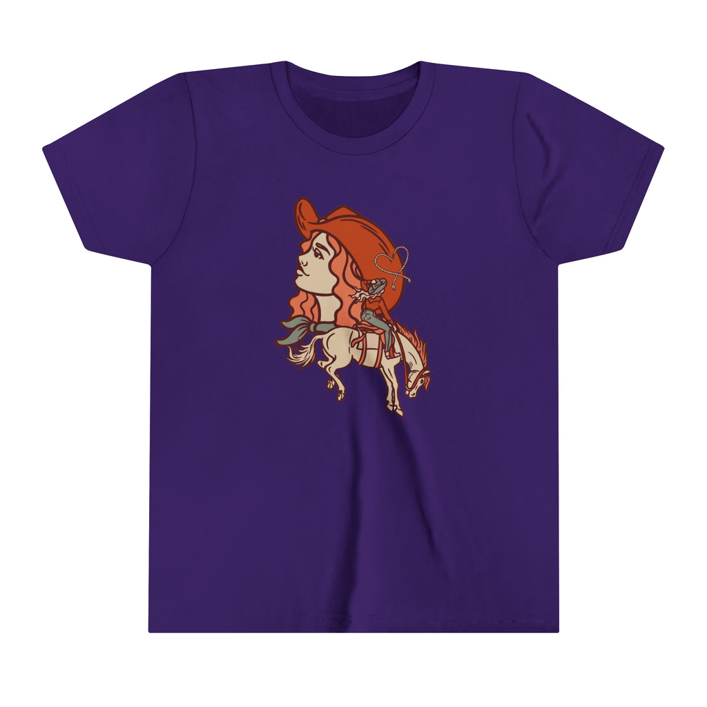 Purple youth short sleeve with a cowgirl printed design and bronc horse with a cowgirl showing a cowgirl's personality. 