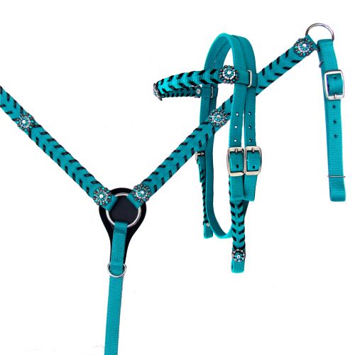 Nylon turquoise headstall with accented with dark blue whip stitch and and crystal conchos. Crystal conchos have turquoise, dark grey and white jewels. 