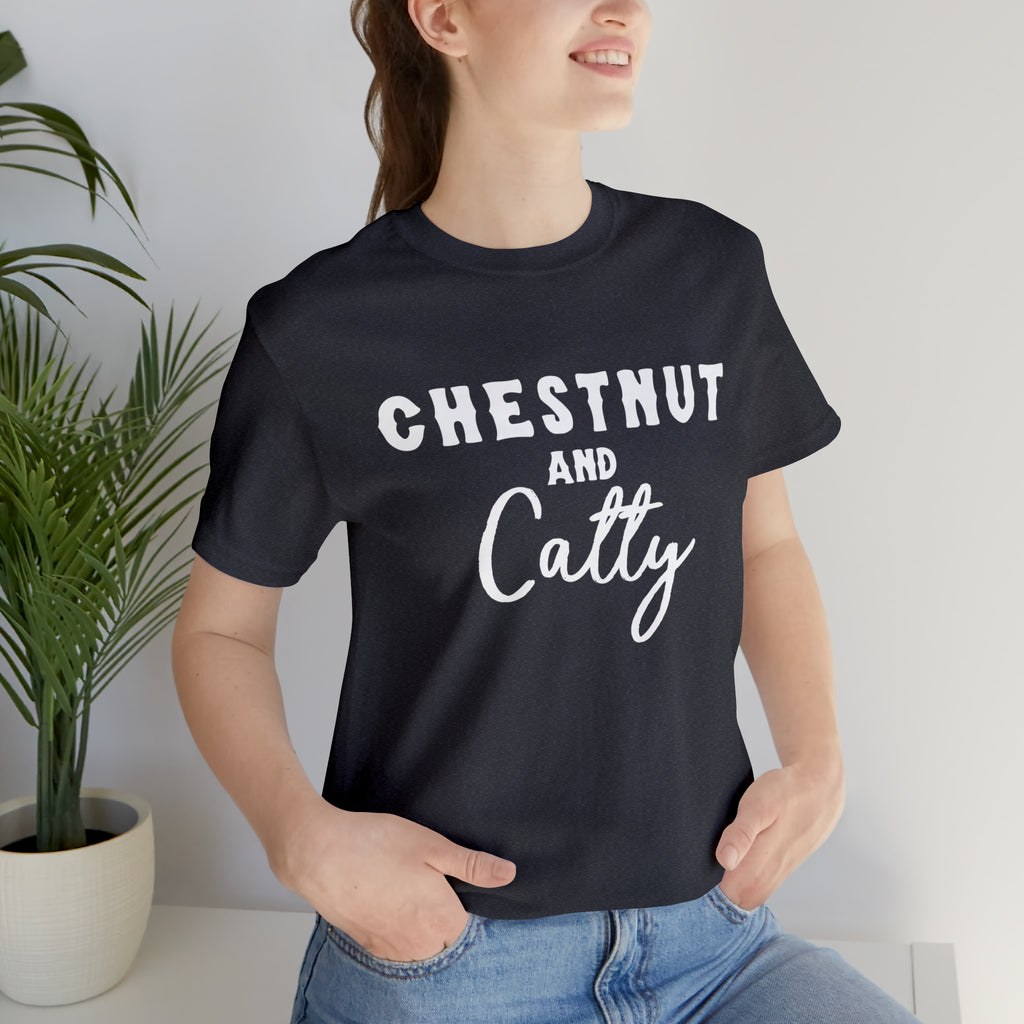 Navy short sleeve with white lettering reading "Chestnut and Catty". 