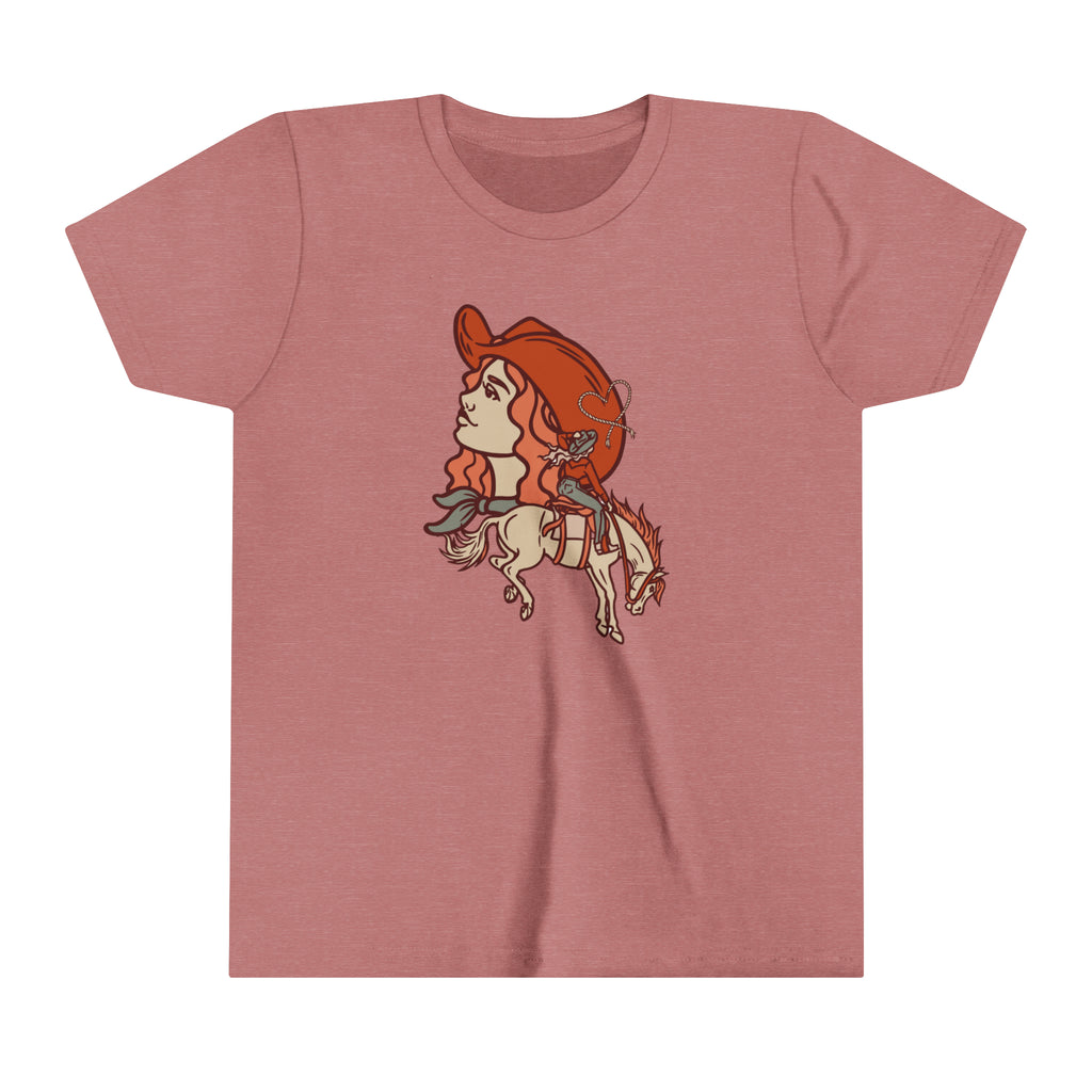 Mauve youth short sleeve with a cowgirl printed design and bronc horse with a cowgirl showing a cowgirl's personality. 