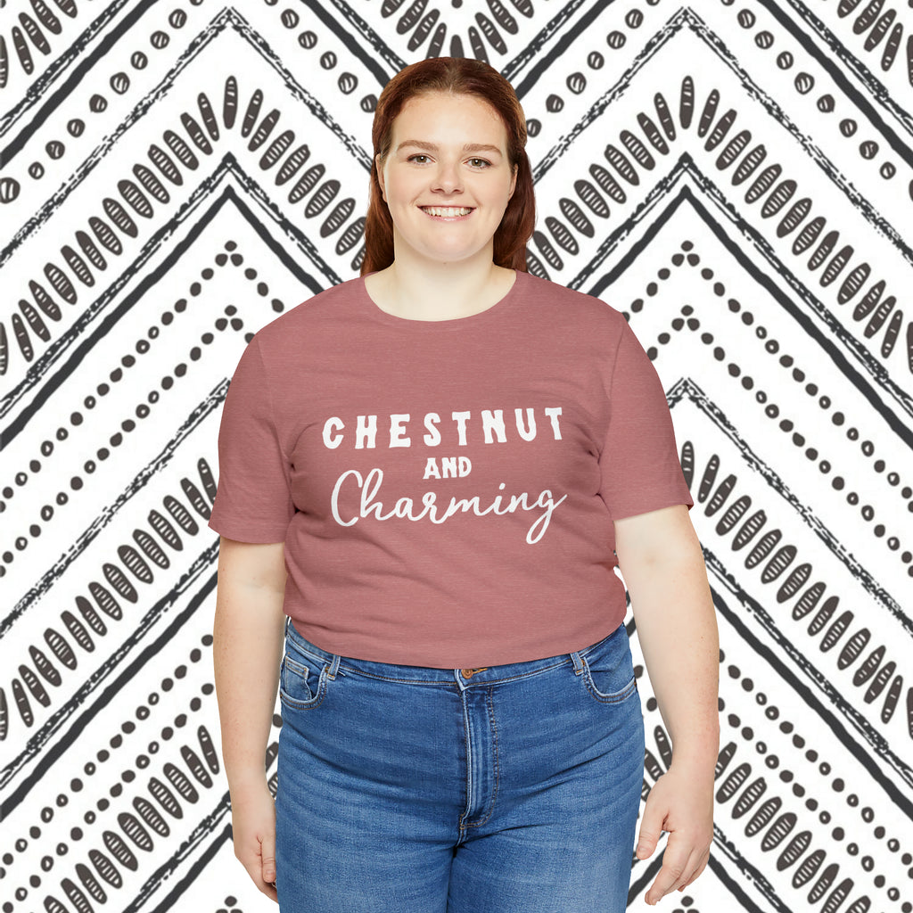 Mauve plus size short sleeve with white lettering reading "Chestnut and Charming". 