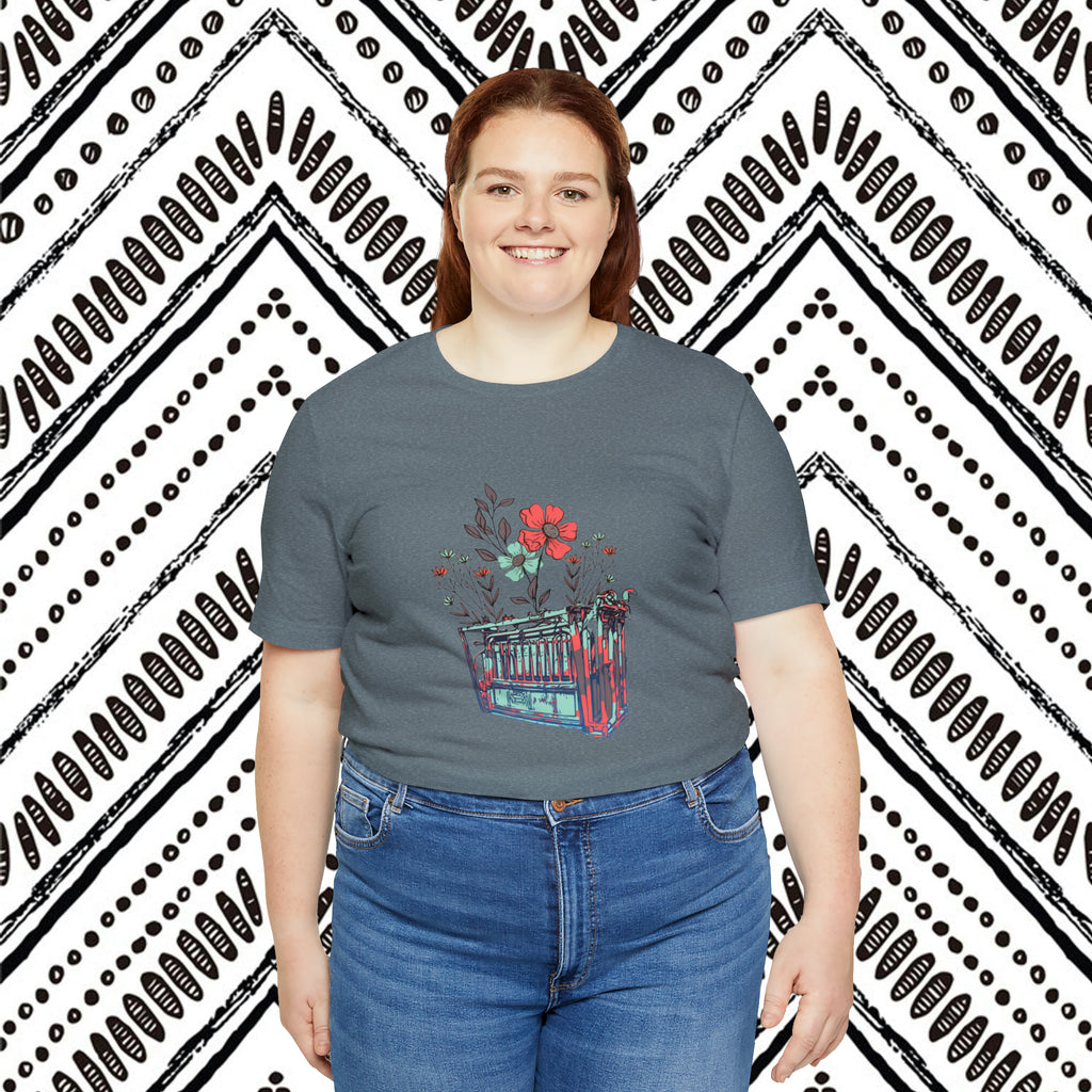 grey plus size short sleeve with flower teal and pink chute in the middle of the tank. 