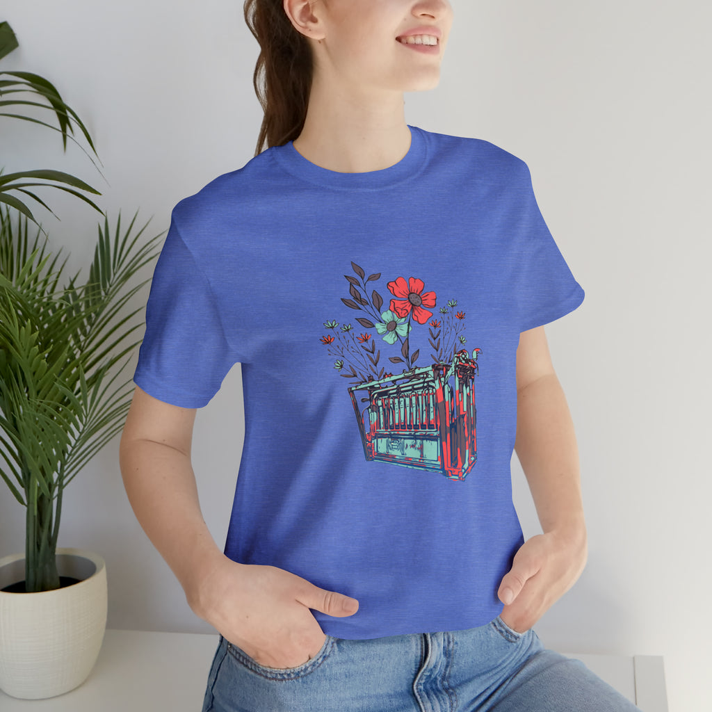 Blue short sleeve with flower teal and pink chute in the middle of the tank. 