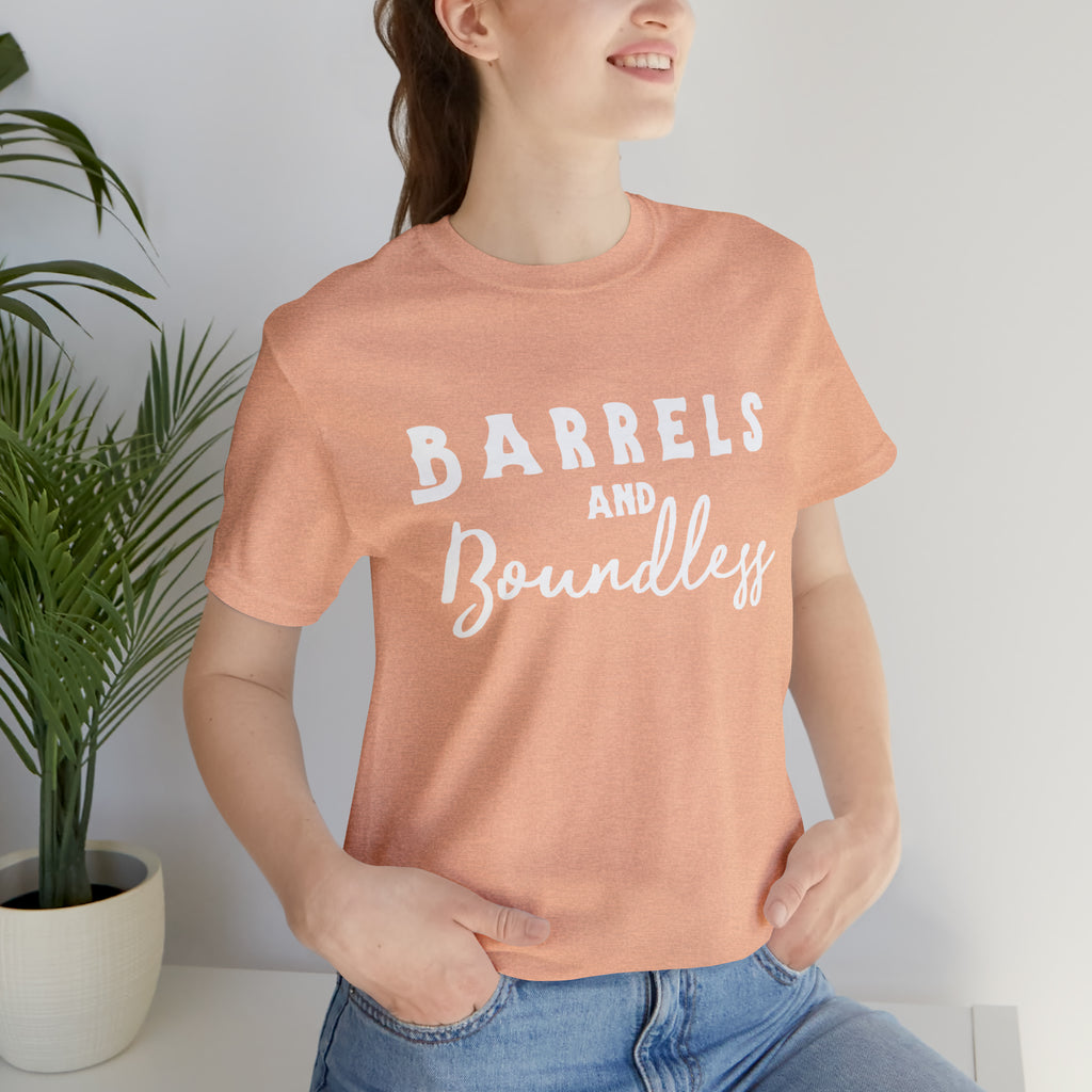  Peach short sleeve with white lettering reading "Barrels and Boundless".