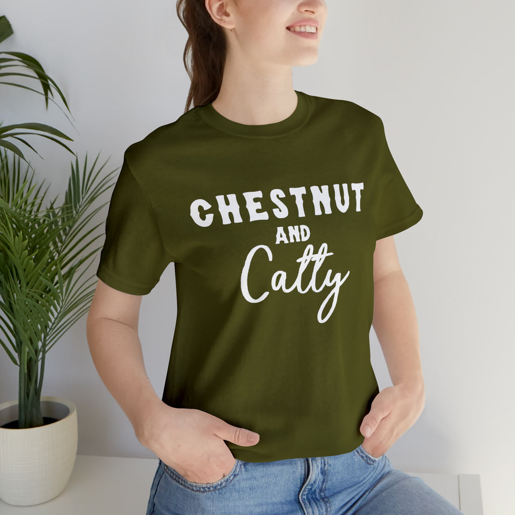 Olive short sleeve with white lettering reading "Chestnut and Catty". 