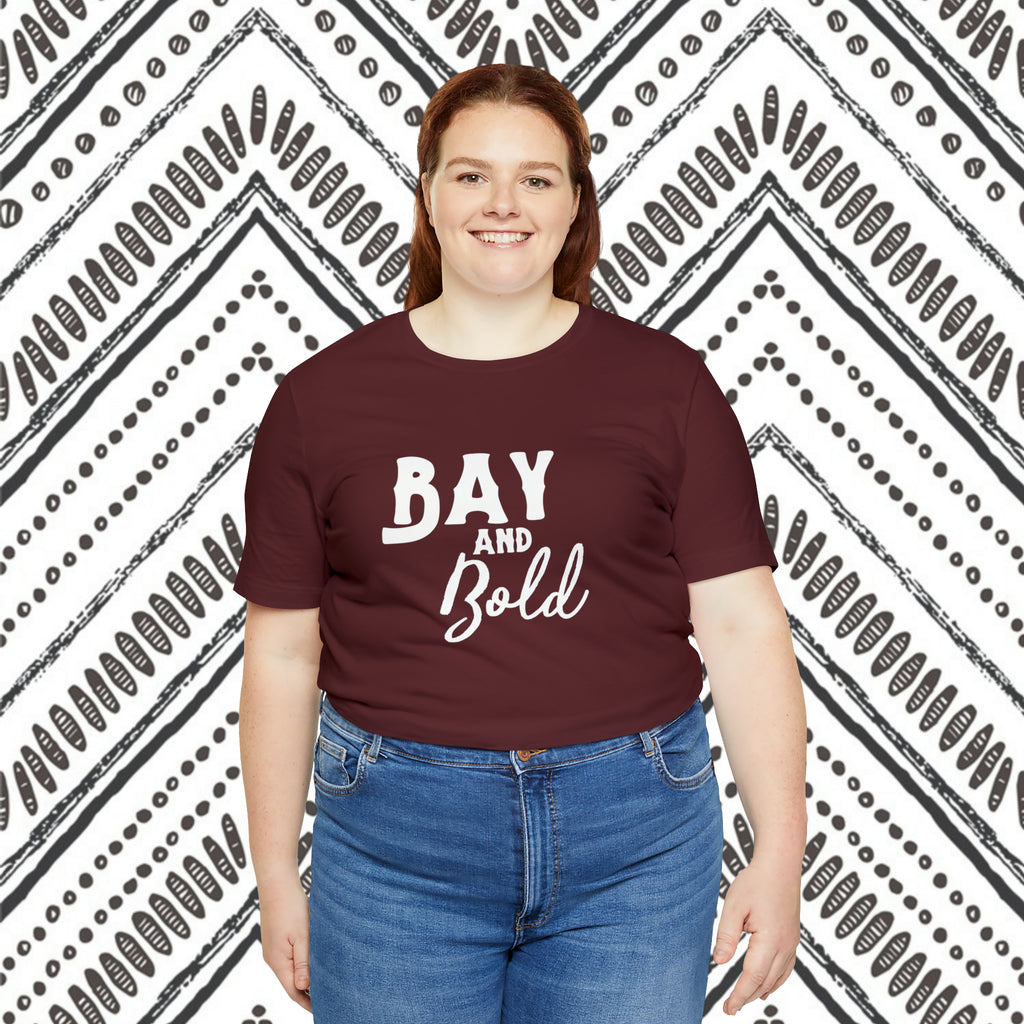 Maroon short sleeve with white lettering reading "Bay and bold".
