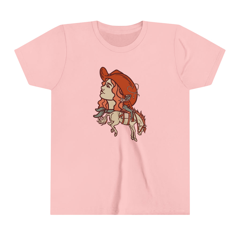 Pink youth short sleeve with a cowgirl printed design and bronc horse with a cowgirl showing a cowgirl's personality. 