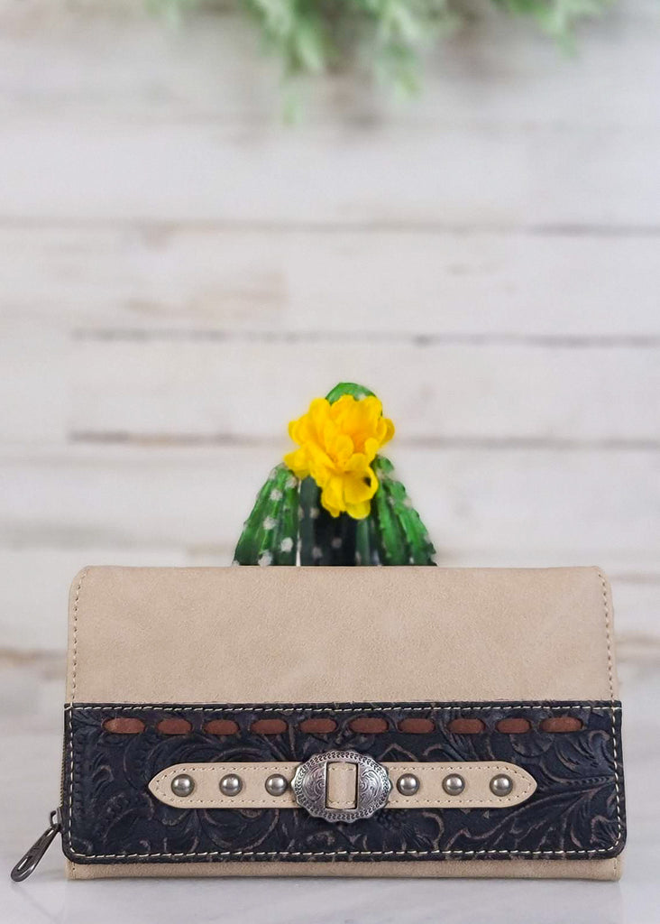 Tan wallet with dark floral embossment front