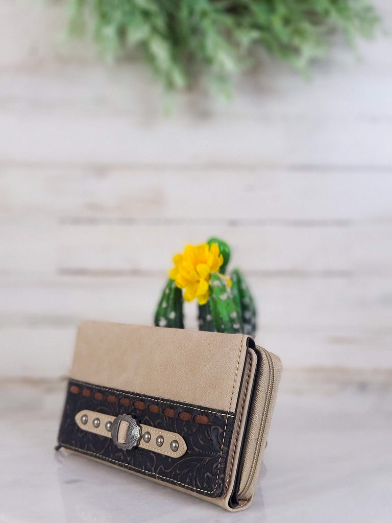 Tan wallet with dark floral embossment side