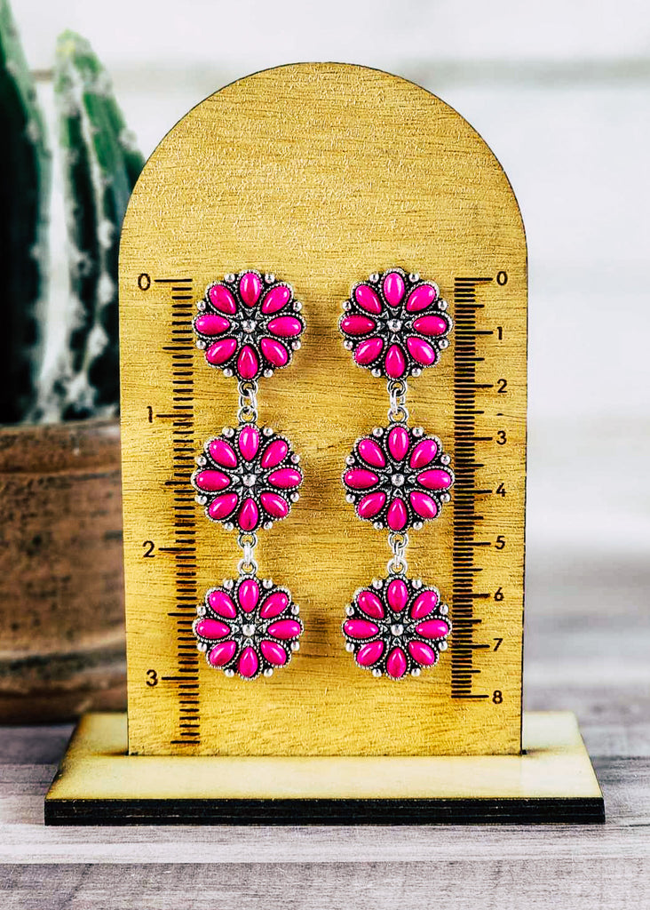 Cowgirl stud earrings with 3 floral pink stones concho two hanging down.  About 3" hang. 