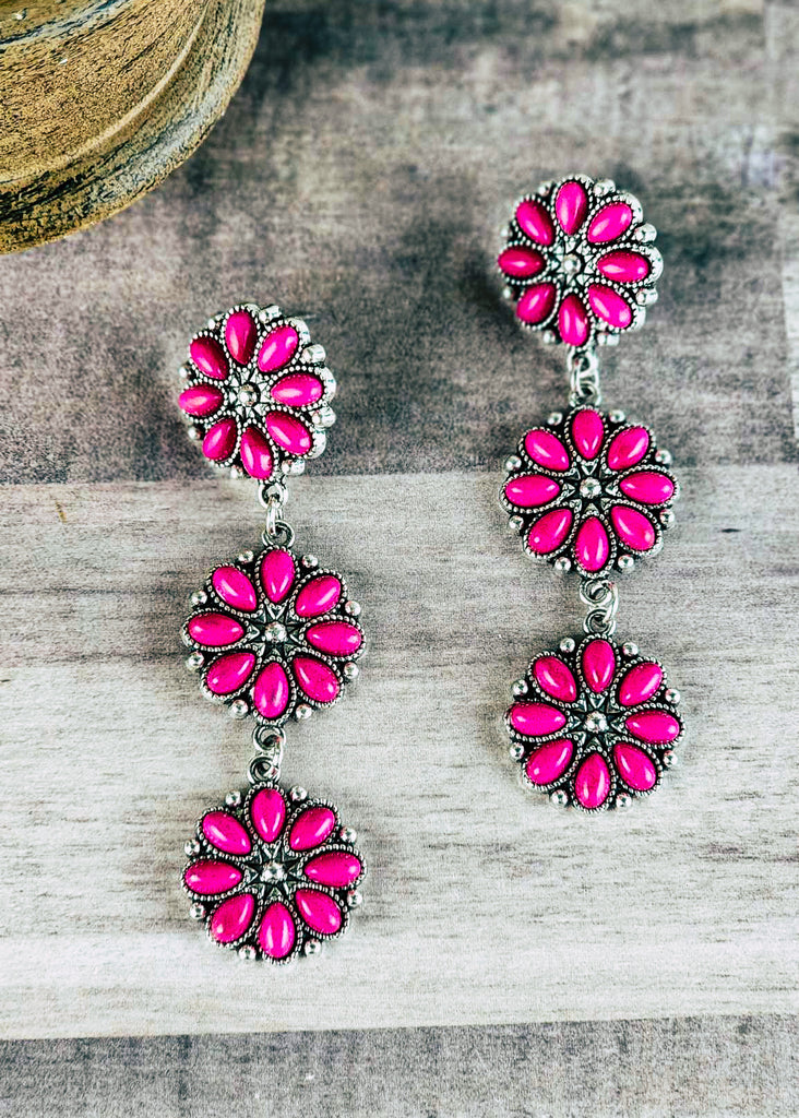 Cowgirl stud earrings with 3 floral pink stones concho two hanging down.  