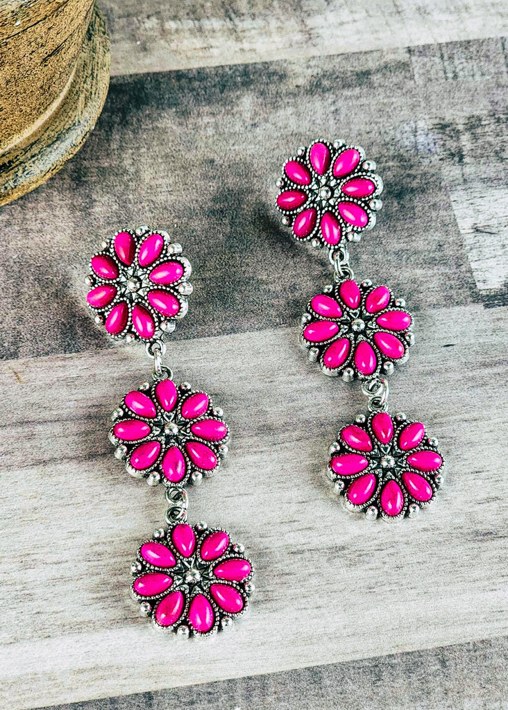 Cowgirl stud earrings with 3 floral pink stones concho two hanging down.  