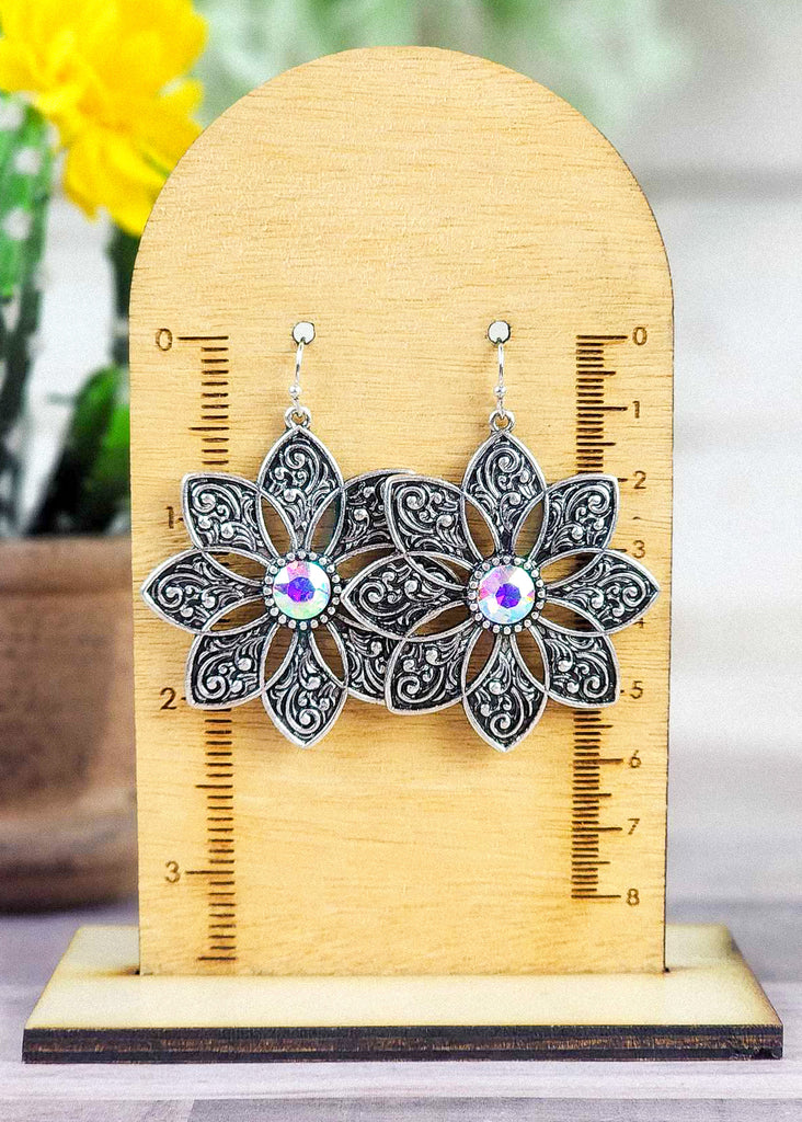 Cowgirl antique silver floral earrings with jewel stone that changes color in different lighting. 