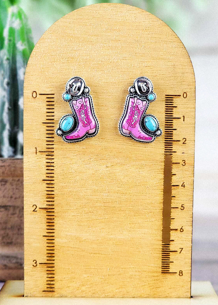 Cowgirl pink designed boots, turquoise like stones, and hat stud earring.
