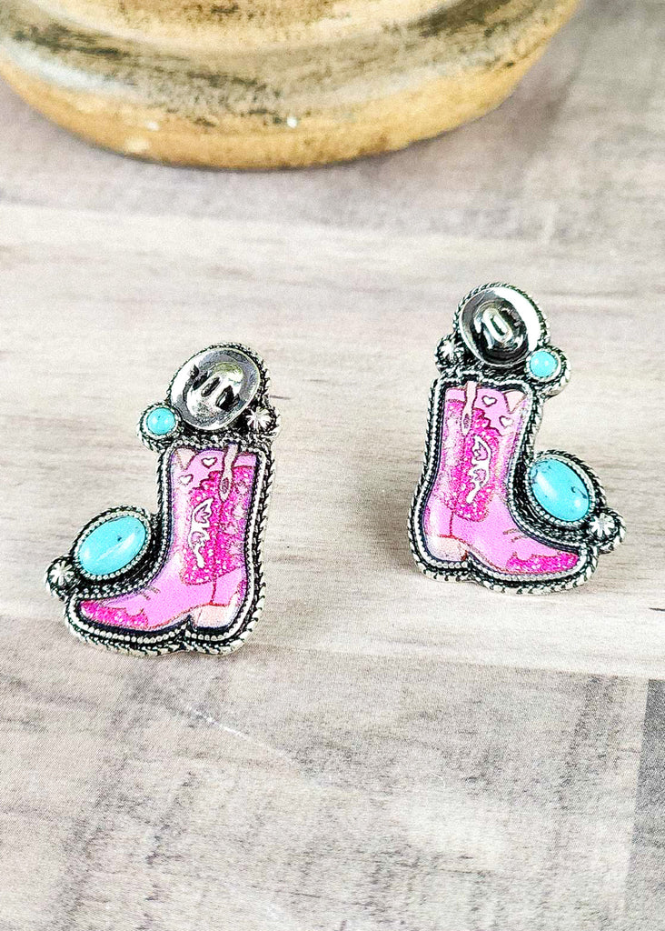 Pink cowgirl boot and hat stud earring with turquoise-like stones and antique silver designs. 