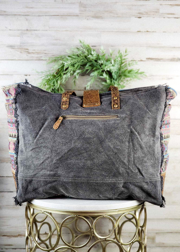Southwestern weekender bag back canvas with zippered pocket. 