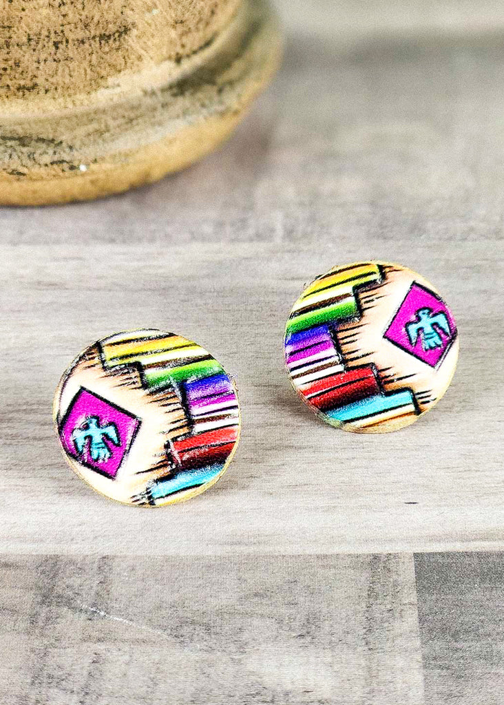 Southwestern style earrings with tooled aztec design, painted thunder bird, and painted to remind you of land to sunset sky. 