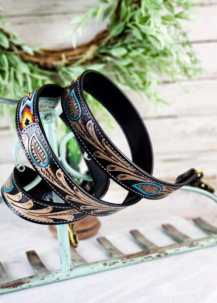 Coiled southwestern strap showing the beautiful leaf-like hand tooling. 