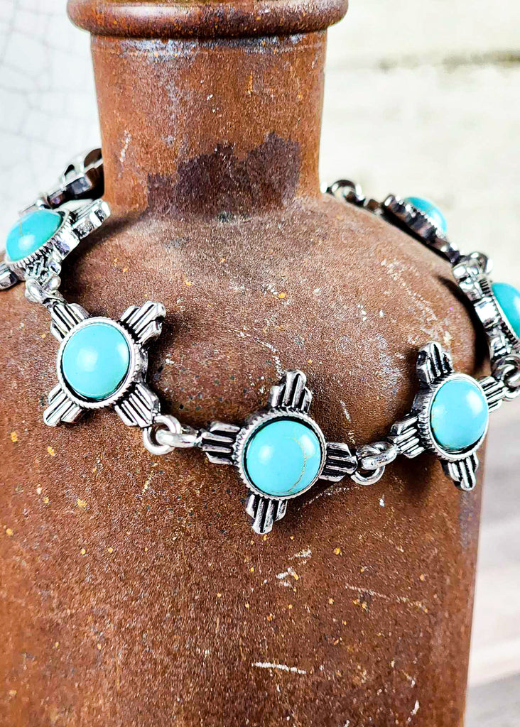Southwestern cowgirl bracelet with antique silver cross and turquoise like stone and magnetic clip (not pictured). turquoise zia jewelry