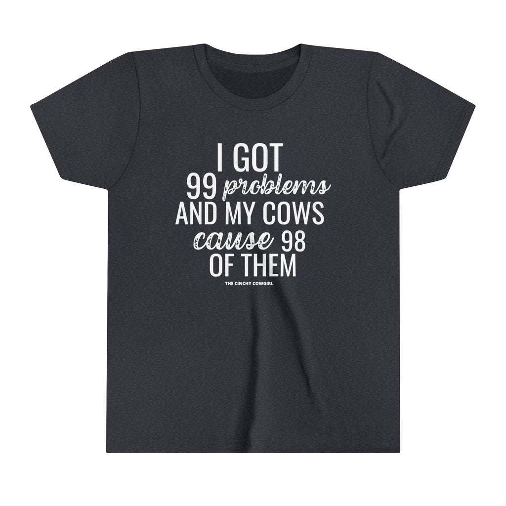 Navy youth short sleeve tee with white lettering reading "I got 99 problems and my Cows cause 98 of them".