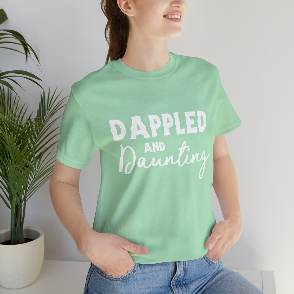 Mint short sleeve with white lettering reading "Dappled and Daunting". 