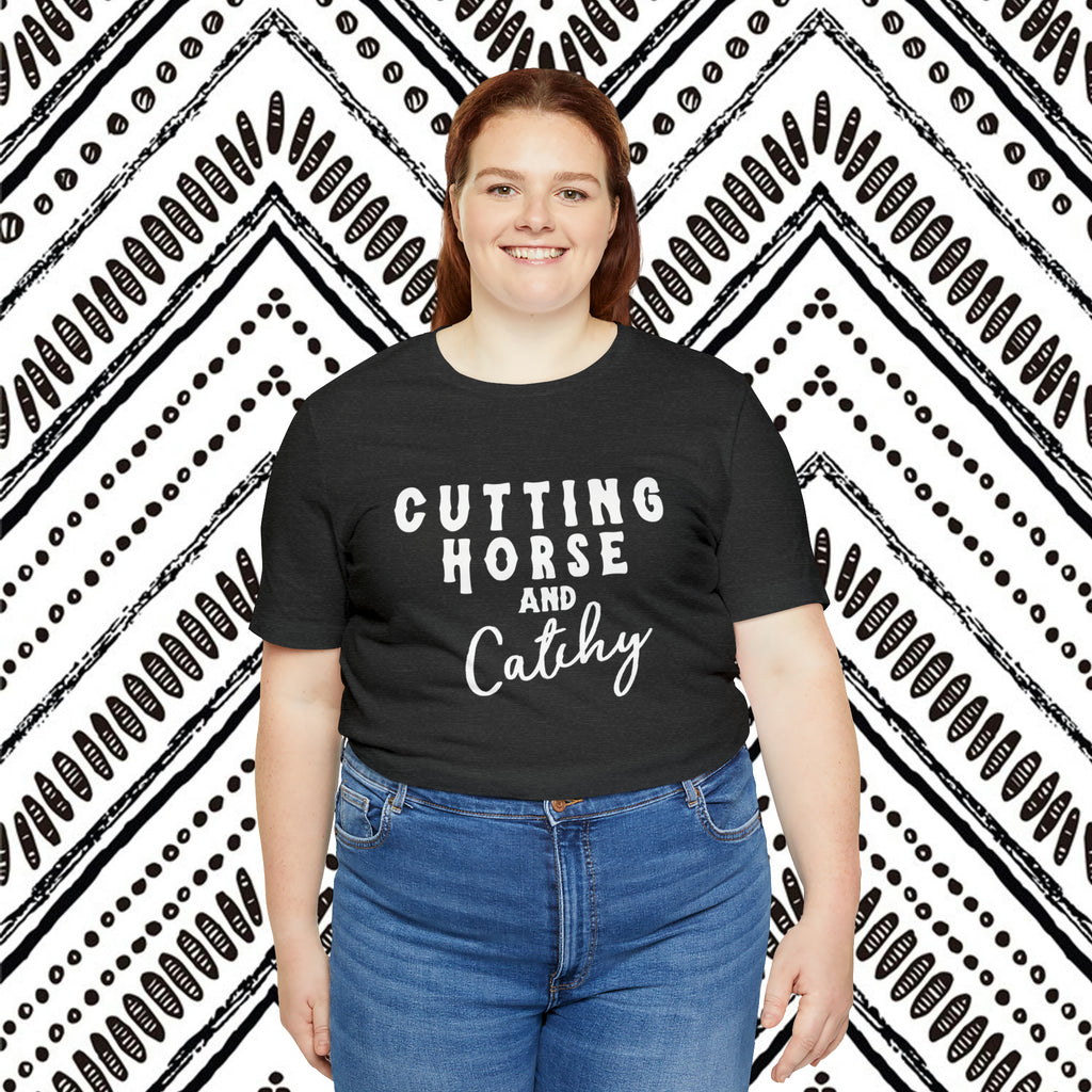 Dark grey plus size short sleeve with white lettering reading "Cutting horse and Catchy".