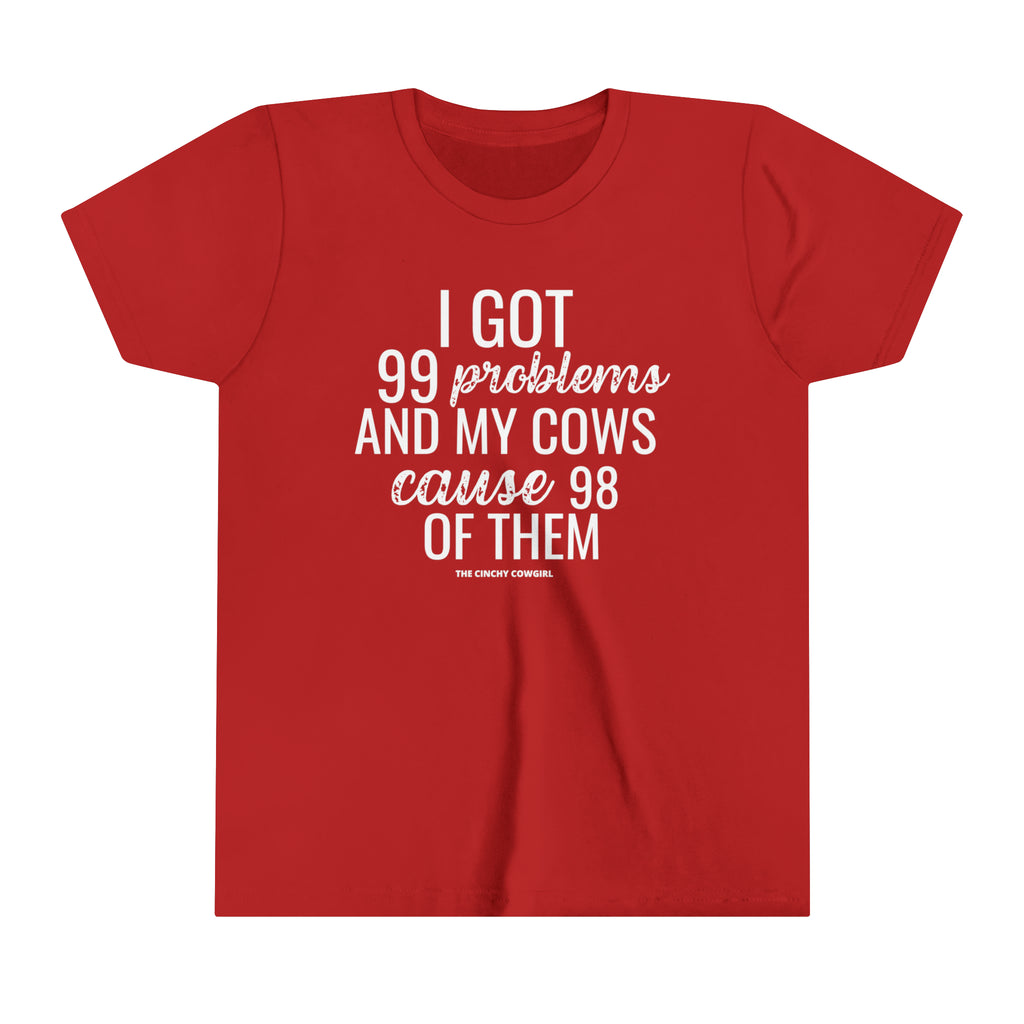 Red youth short sleeve tee with white lettering reading "I got 99 problems and my Cows cause 98 of them".