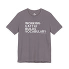Working Cattle Builds Vocabulary Short Sleeve Tee T-Shirt The Cinchy Cowgirl - Print Storm XS