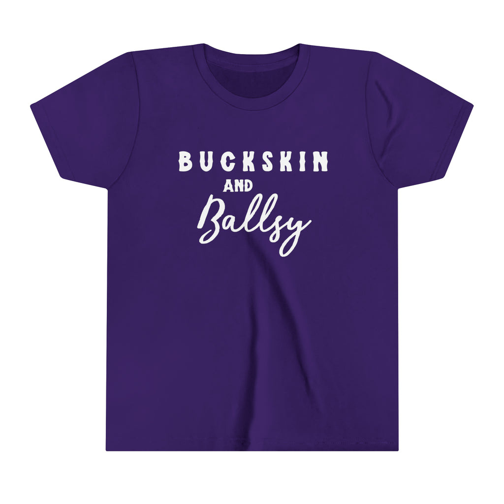 Purple youth short sleeve with white lettering reading "Buckskin and Ballsy". 