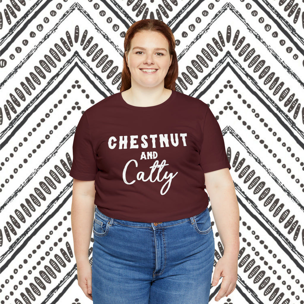 Maroon plus size short sleeve with white lettering reading "Chestnut and Catty". 