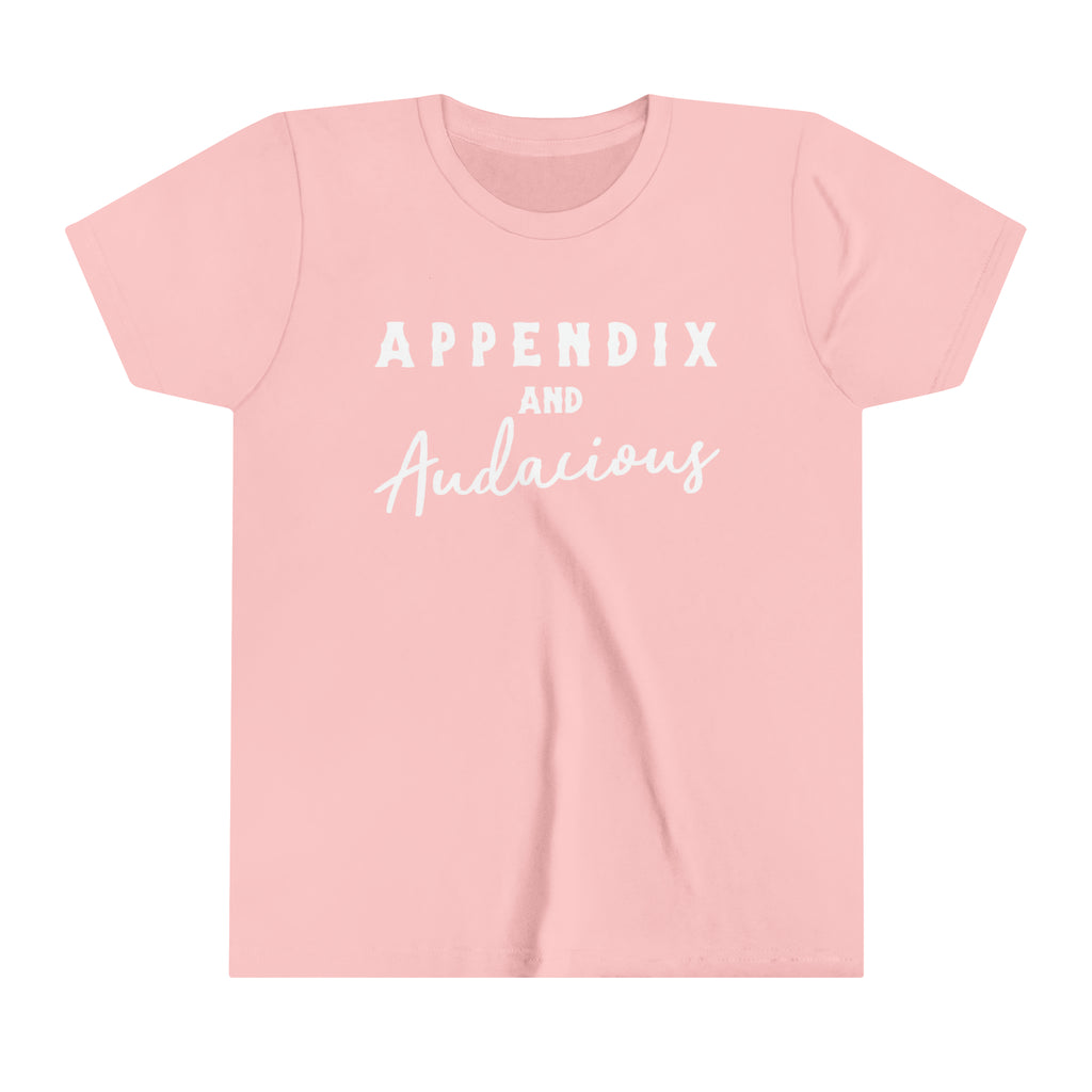 Pink youth short sleeve with white lettering that says "Appendix and Audacious".