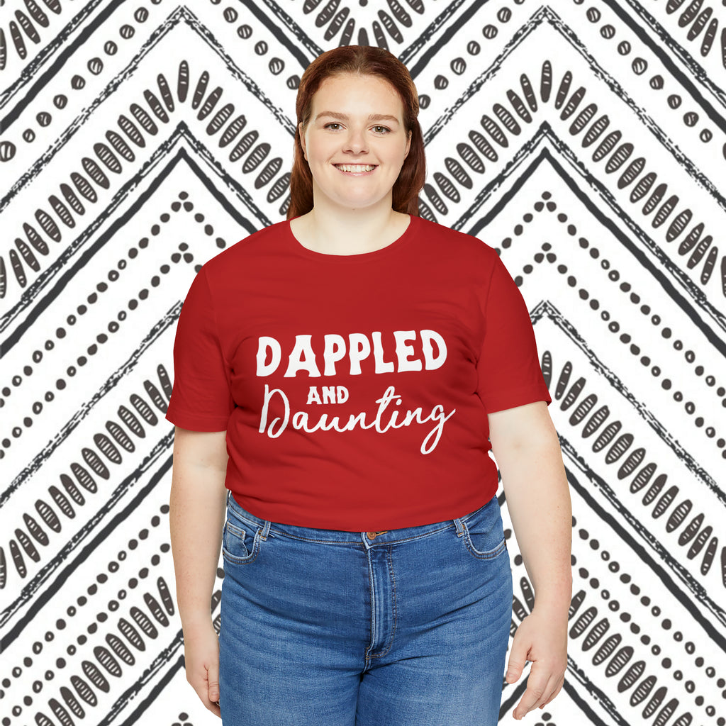Red plus size short sleeve with white lettering reading "Dappled and Daunting". 