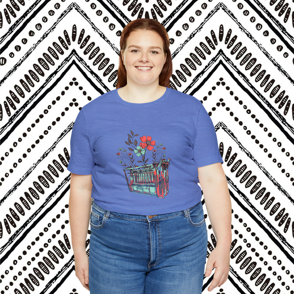 Blue plus size short sleeve with flower teal and pink chute in the middle of the tank. 