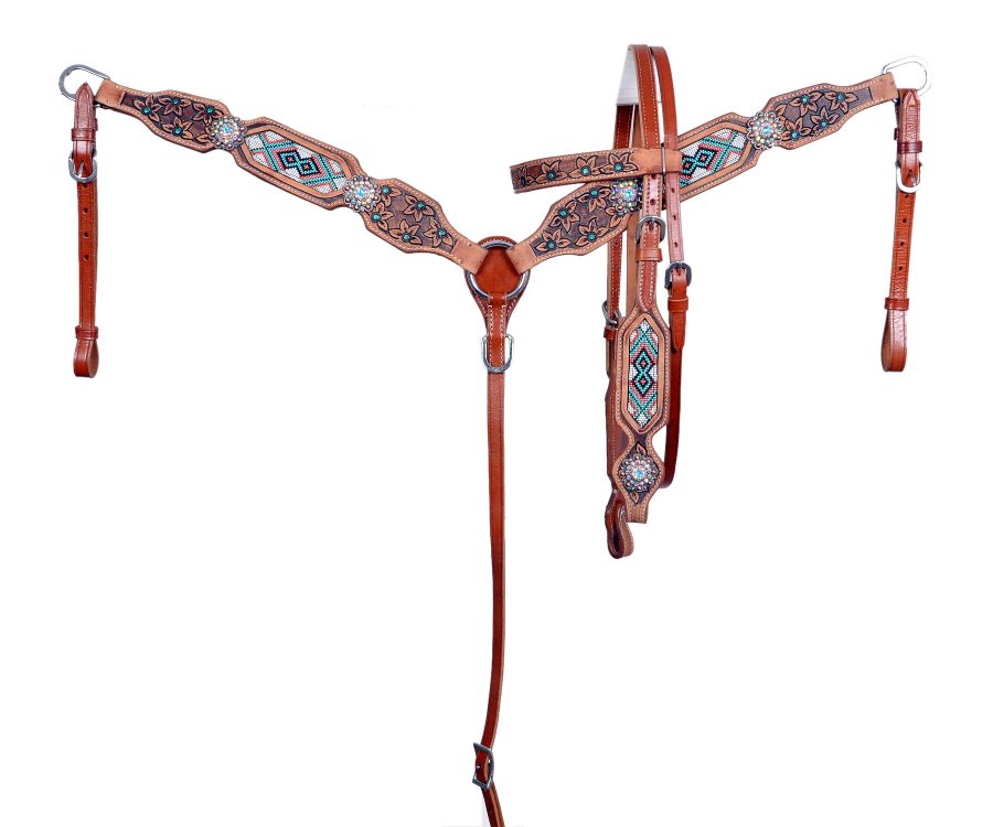 Western medium oil headstall set with beaded southwestern style inlays and floral tooling. Floral toolings have turquoise colored middle. Southwestern beading style with white, turquoise, and reds. Jewel conchos. 