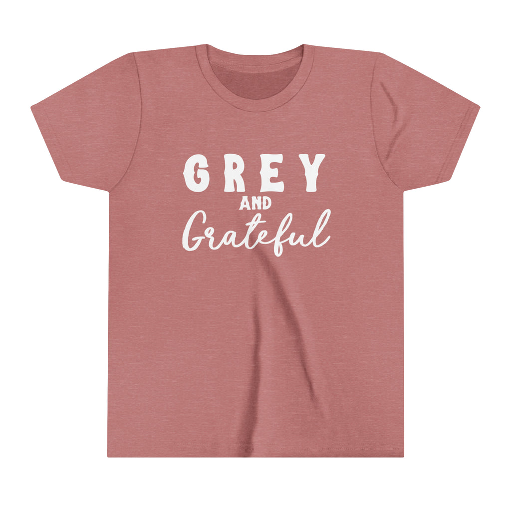 Mauve youth short sleeve with white lettering reading "Grey and Grateful". 