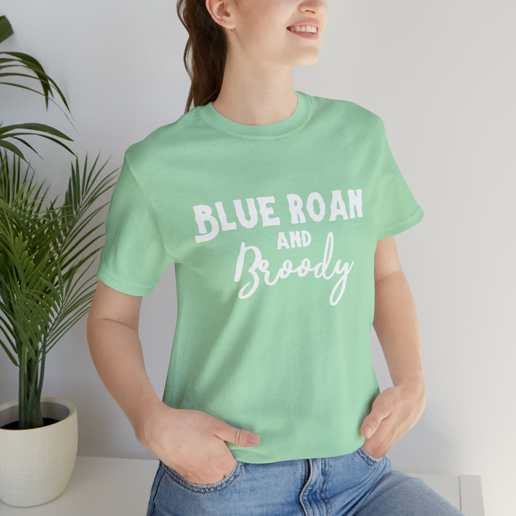 Mint short sleeve with white lettering reading "Blue Roan and Broody". 