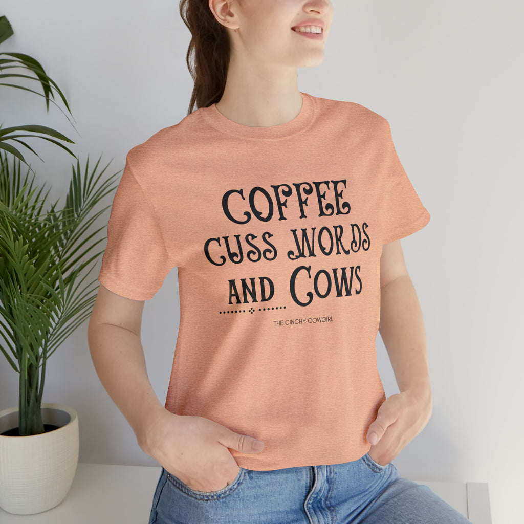 Coffee Cuss Words & Cows Short Sleeve Graphic Tee T-Shirt Printify Heather Peach S 