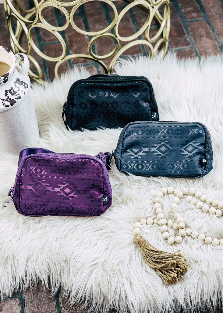 Purple, blue and black Aztec embossed fanny pack. 