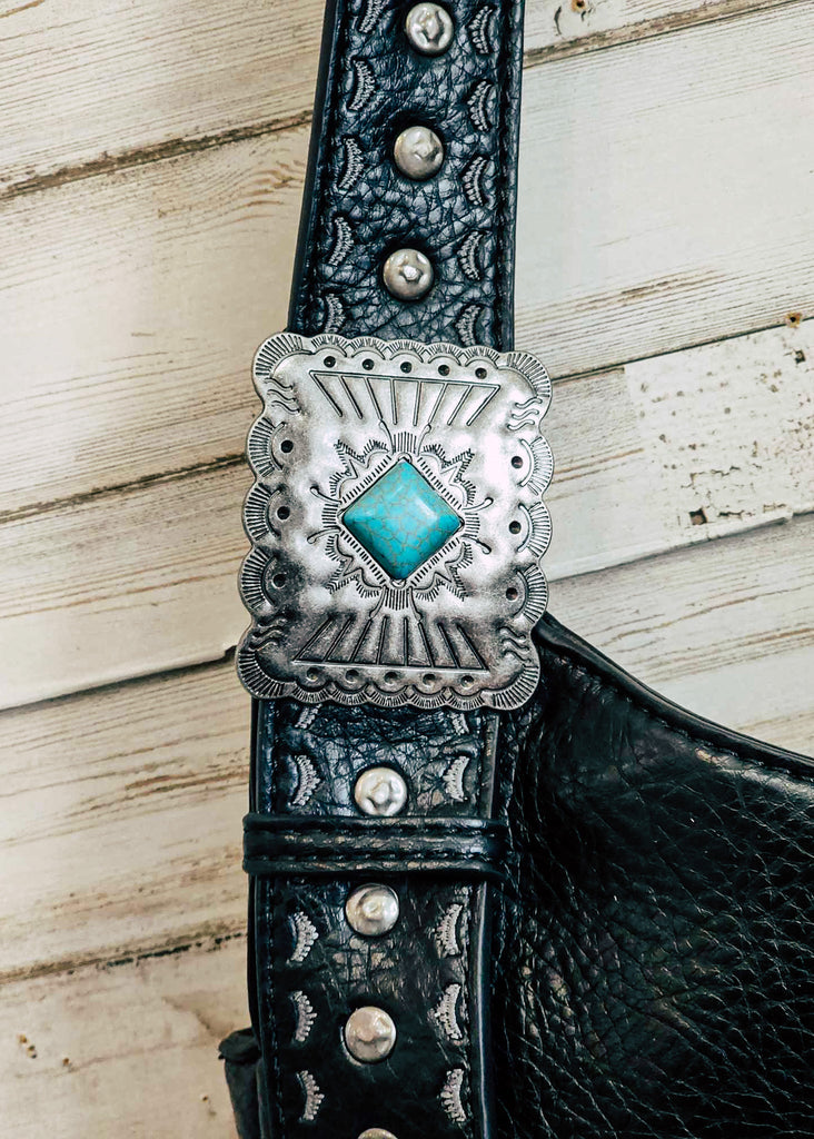 Black Turquoise Stone Concho Fringe Hobo close up of southwestern buckle with turquoise stone