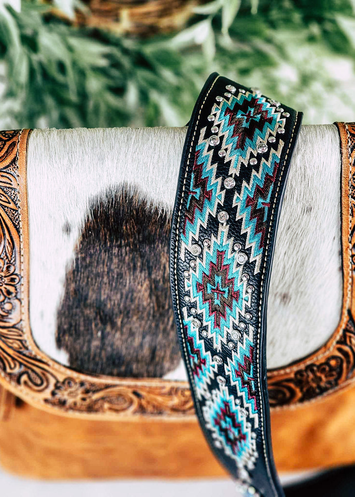 Western stitched black & turquoise aztec guitar or purse strap with diamond like jewels throughout the strap. 