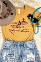 Mustard Riding With A Purpose Graphic Tee tcc graphic tee The Cinchy Cowgirl