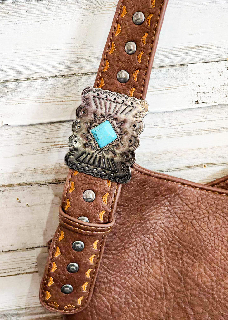 Concealed Carry Coffee Turquoise Stone Concho Fringe Hobo, close up of southwestern buckle with turquoise stone