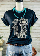 Cowgirl Days Floral Chaps Short Sleeve Tee [2 Colors] tcc graphic tee - $19.99 The Cinchy Cowgirl Black Small 