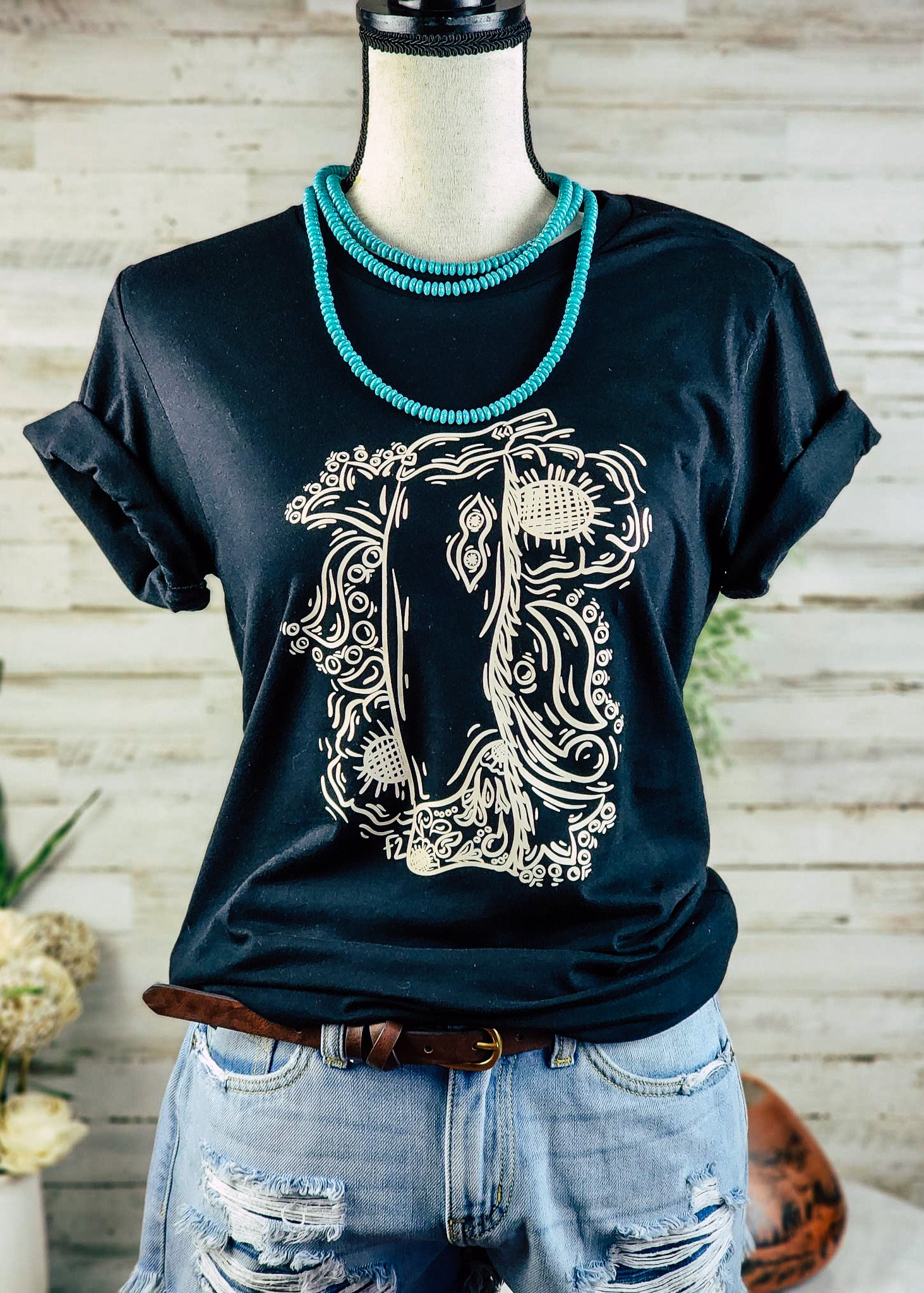 Cowgirl Days Floral Chaps Short Sleeve Tee [2 Colors] tcc graphic tee - $19.99 The Cinchy Cowgirl Black Small 
